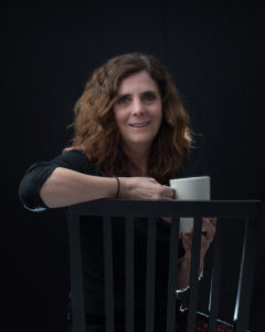 Beth Kephart holding coffee cup
